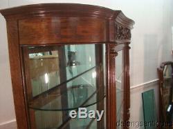 53383Fabulous Late 1800's Carved Oak Round Glass China Cabinet
