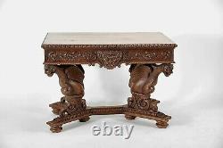 A Continental Renaissance Revival Carved Oak Center Table, Late 19th Century