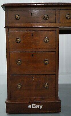 A Late 19th Century Oak Pedestal Desk With Brass Ring Handles