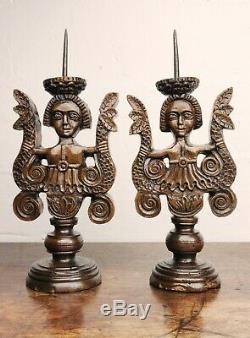 A Rare pair of late Elizabethan walnut prickets