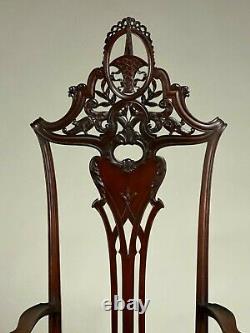 AN EXTRAORDINARY SET OF LATE 19th CENTURY SIX CARVED MAHOGANY DINING CHAIRS