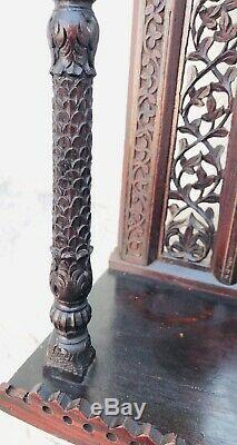 Antique Anglo Indian heavily carved Hanging Shelf and Mirror late 19th century
