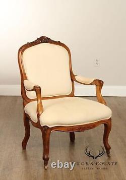 Antique French Louis XV Style Pair of Carved Walnut Fauteuil Armchairs