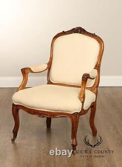 Antique French Louis XV Style Pair of Carved Walnut Fauteuil Armchairs