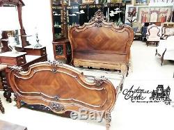 Antique French Louis XV style carved walnut bed. Late 19th century FULL SIZE