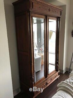 Antique French Victorian armoire, European Oak dark stain, late 1880s