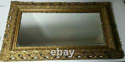 Antique Late 19th 1890s Beveled Glass Wall Mirror Carved Wood Frame Gold Gilt