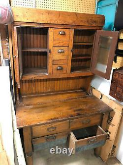 Antique baker's cupboard Late 1800's, tin grain bins, hammered glass doors