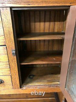 Antique baker's cupboard Late 1800's, tin grain bins, hammered glass doors