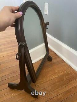 Arched wooden vanity mirror with holder, late Victorian freestanding