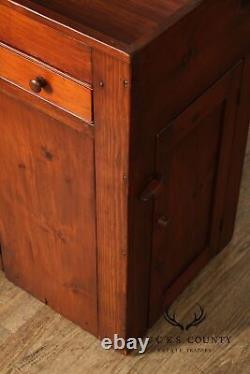 B. Delin Farmhouse Style Pine Drysink Cabinet