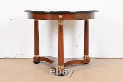 Baker Furniture French Empire Cherry Wood, Brass, and Ebonized Tea Table