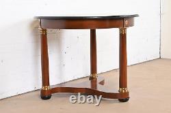 Baker Furniture French Empire Cherry Wood, Brass, and Ebonized Tea Table