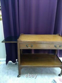Baker Furniture Palladian Walnut and Cherry Bar Cart MCM from late 1960s