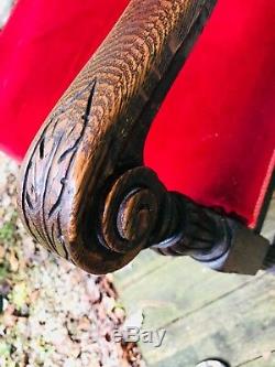 French antique arm chair fit for king. Carved griffin head C late 1800