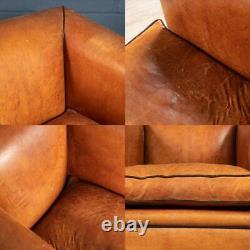 LATE 20th CENTURY PAIR OF ART DECO STYLE DUTCH SHEEPSKIN LEATHER CLUB CHAIRS