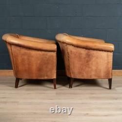 LATE 20th CENTURY PAIR OF DUTCH SHEEPSKIN LEATHER CLUB CHAIRS