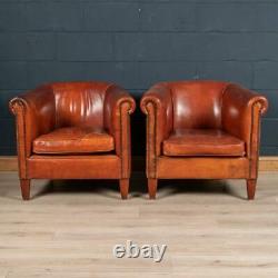 LATE 20th CENTURY PAIR OF DUTCH SHEEPSKIN LEATHER TUB CHAIRS