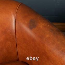 LATE 20th CENTURY PAIR OF DUTCH SHEEPSKIN LEATHER TUB CHAIRS