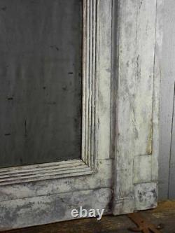 Late 18th Century Directoire trumeau mirror with grey patina 42½ x 43