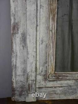 Late 18th Century Directoire trumeau mirror with grey patina 42½ x 43