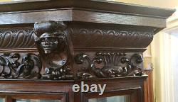 Late 19th Century Carved Oak Figural Display China Liquor Cabinet