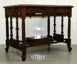 Late 19th Century Continental Carved Walnut Writing Table On Leather Inset Top