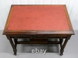 Late 19th Century Continental Carved Walnut Writing Table On Leather Inset Top