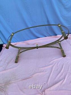 Late 20th Century Hollywood Regency Oval Glass and Brass Coffee Table