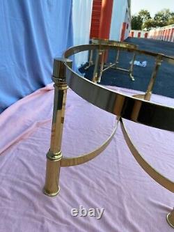 Late 20th Century Hollywood Regency Oval Glass and Brass Coffee Table