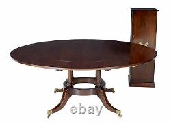 Late 20th Century Mahogany Jupe Dining Table With Leaf Cabinet