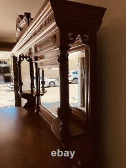 Late Victorian Oak Sideboard 85 H. 24 D. 72 W. Ornate. Beveled Mirrors