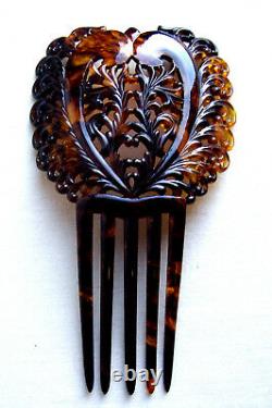 Late Victorian Spanish style hair comb with carved effect