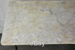 Late nineteenth century French marble presentation table with cast iron base 23¾