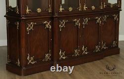 Monumental French Louis XVI Style Mahogany, Partial Gilt Breakfront