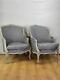 Pair of late nineteenth-century Louis XV style French Bergere armchairs