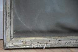 Small late 19th Century rectangular mirror with silver-leaf frame