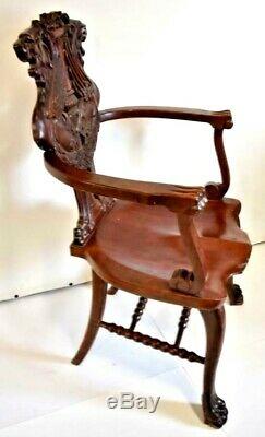 Solid mahogany griffon shield Captains Chair Circa late 1800's