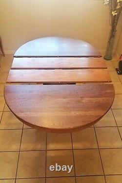 Used Antique Round Oak Claw Foot Dining Table 42 in. With 2 leaves and 6 chairs