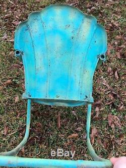 Vintage Ed Warmack clam shell back metal child's chair. Dates back to late 40s